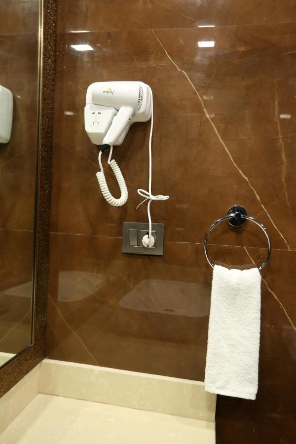 Omega - Central, Sec 45 Hotel