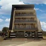 Limewood Stay-Gold 1 Bhk Apartment Artemis Hospital
