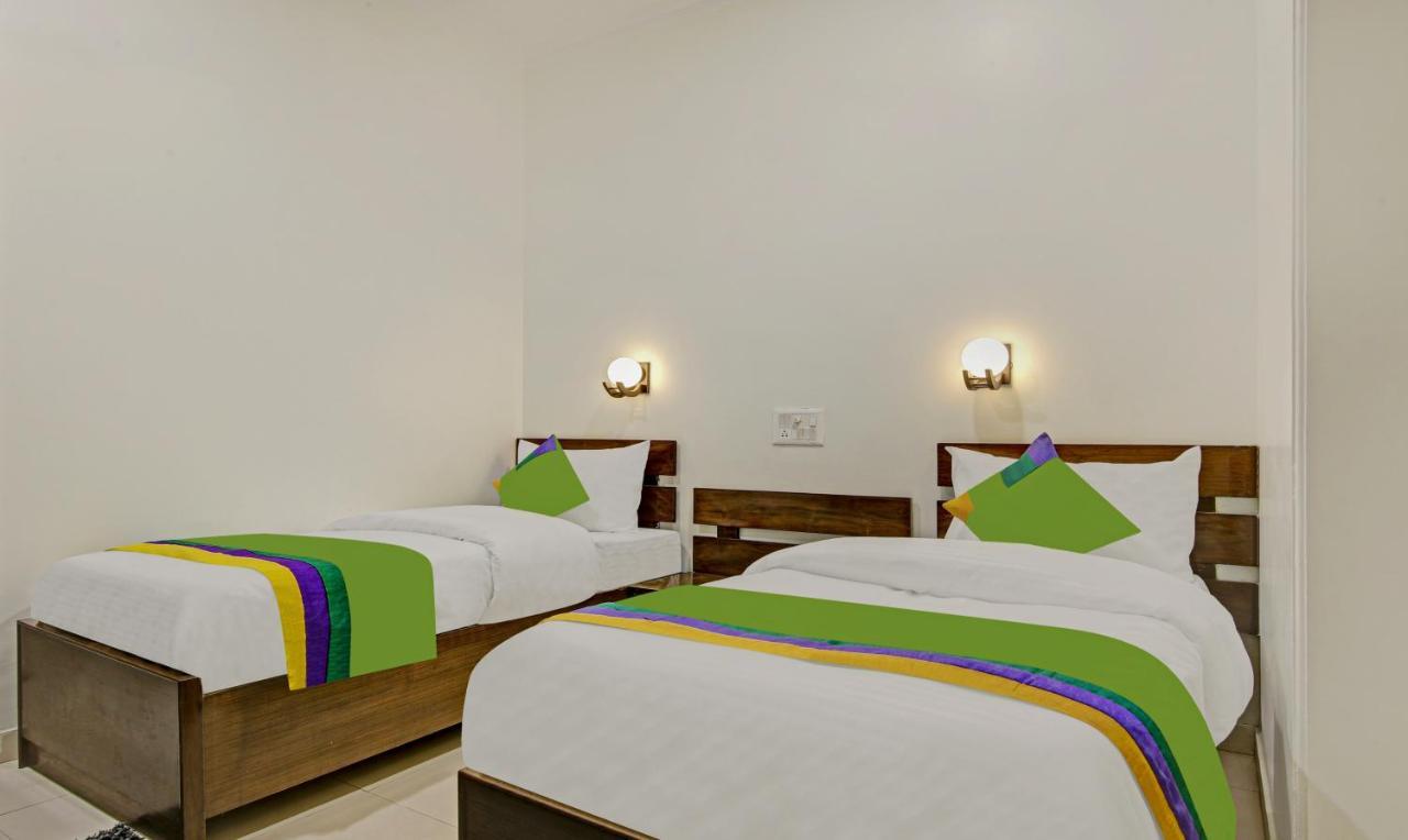 Treebo Trend Amexx Golf Course Road Hotel