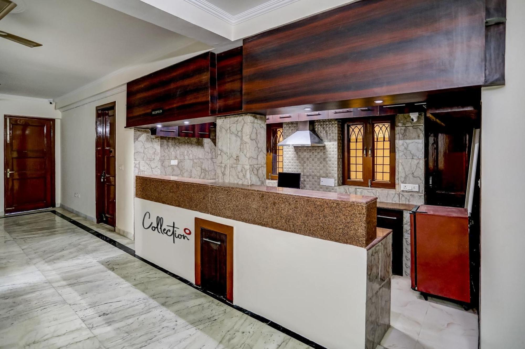 Capital O Uk House Residency Hotel